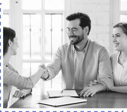 Dealer and customer shaking hands after contract signing